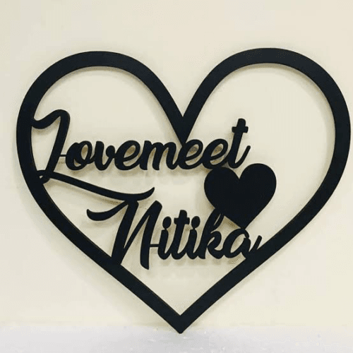 Heart Art - Custom heart-shaped wall hanging featuring personalized couple names, perfect for celebrating love and as a thoughtful gift